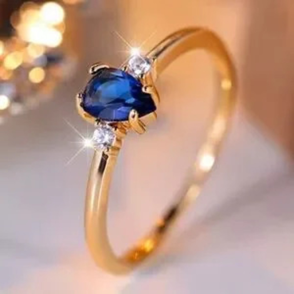 Elegant Gold Ring with Blue Gemstone size 7